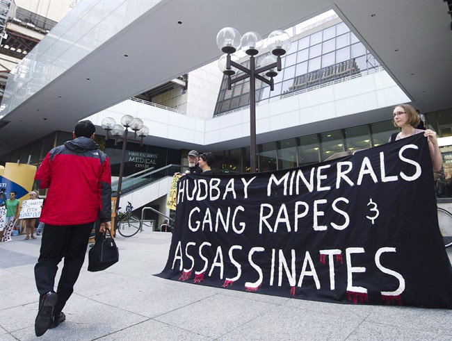 Protesters demonstrate outside the HudBay Minerals Inc. annual general meeting in Toronto. Liberal MP John McKay is calling for stricter oversight of Canadian mining companies abroad as plaintiffs increasingly look to Canadian courts to seek justice. THE CANADIAN PRESS/Nathan Denette.