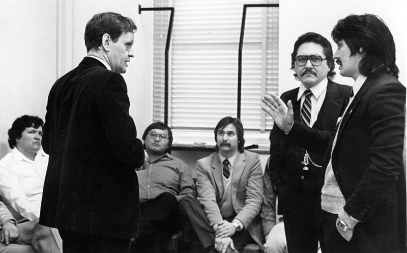 Federal Justice Minister Jean Chretien  meets with representatives of Canada’s native peoples in Ottawa February 2, 1981. Speaking with Chretien is Peter Ittinuar, NDP MP for the eastern Arctic (far right) and Harry Daniels, chairman of the Native Council of Canada.