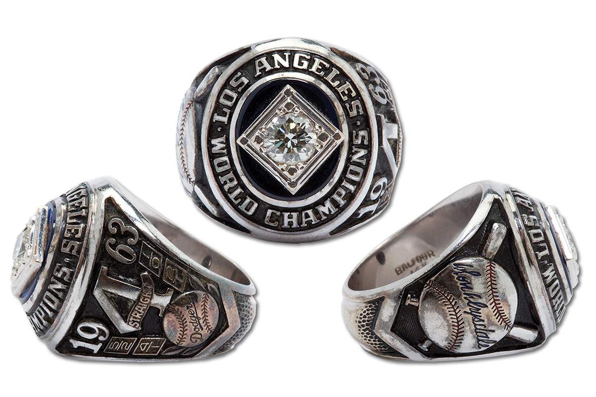 This undated file photo provided by SCP Auctions shows various views of former major league pitcher Don Drysdale's 1963 World Series championship ring. The ring sold at auction for $110,111.