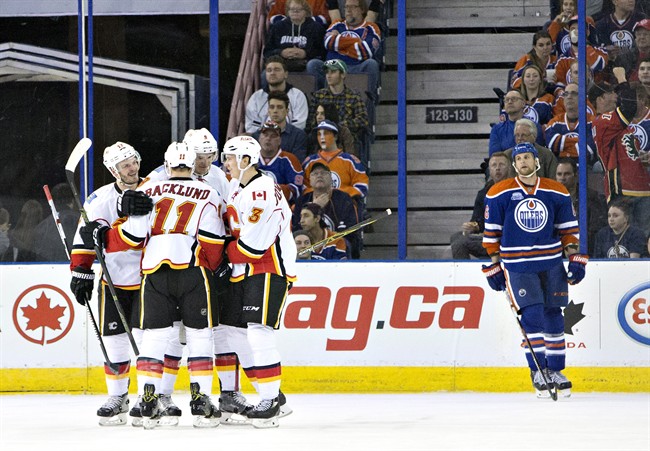 Flames leave Edmonton’s Rexall Place with a win - image