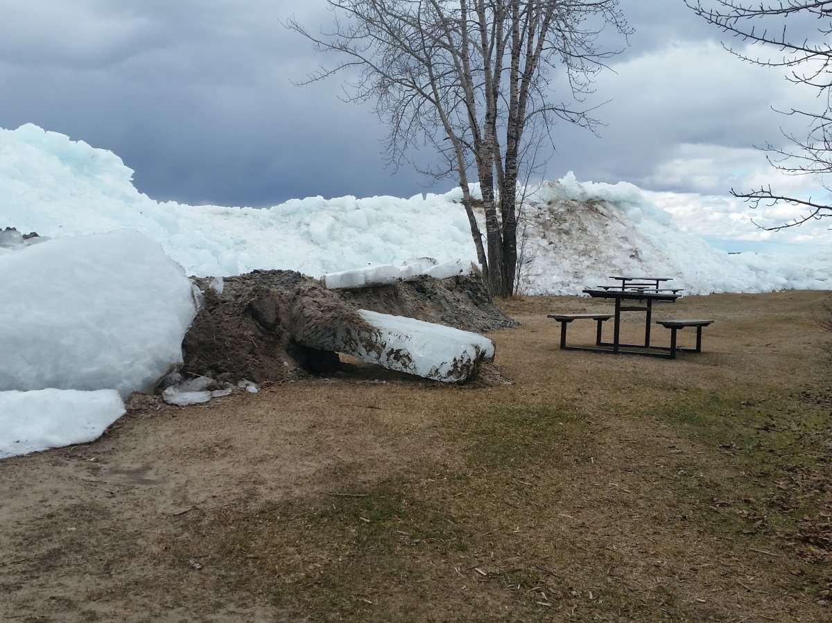 Extreme wind gusts Friday night caused ice to pile up on Pigeon Lake