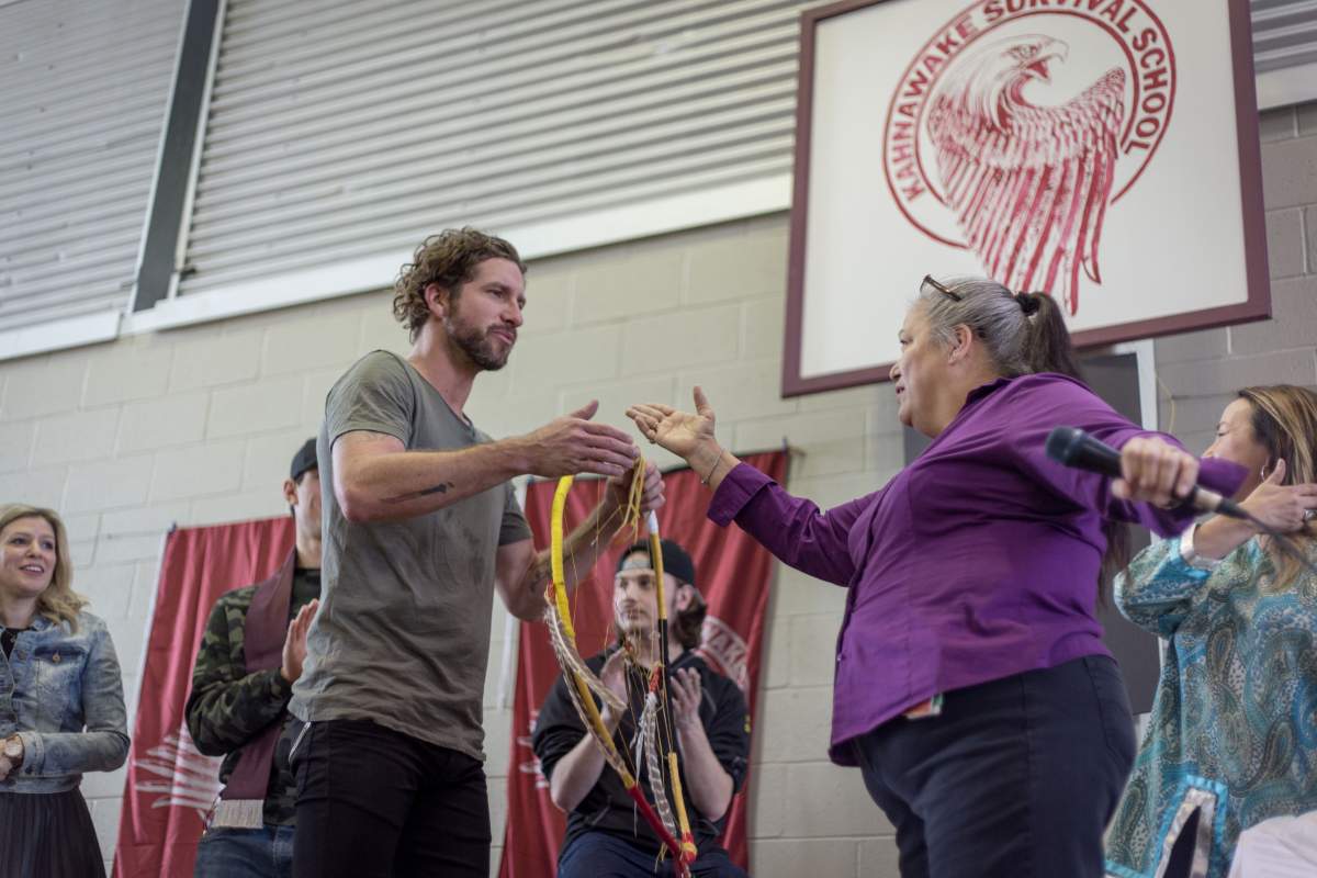 Singer Jonas on stage at Kahnawake Survival School, Wednesday, March 23, 2016.