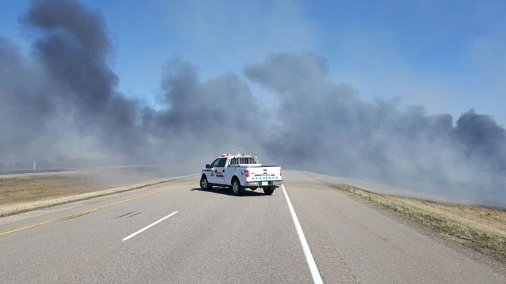 RCMP are advising motorists that both lanes of Highway 16 are blocked due to a grass fire near Paynton, Sask. on Monday.