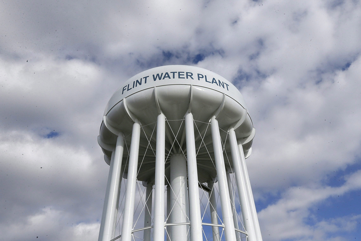In a March 21, 2016 photo, the Flint Water Plant water tower is seen in Flint, Mich. 
