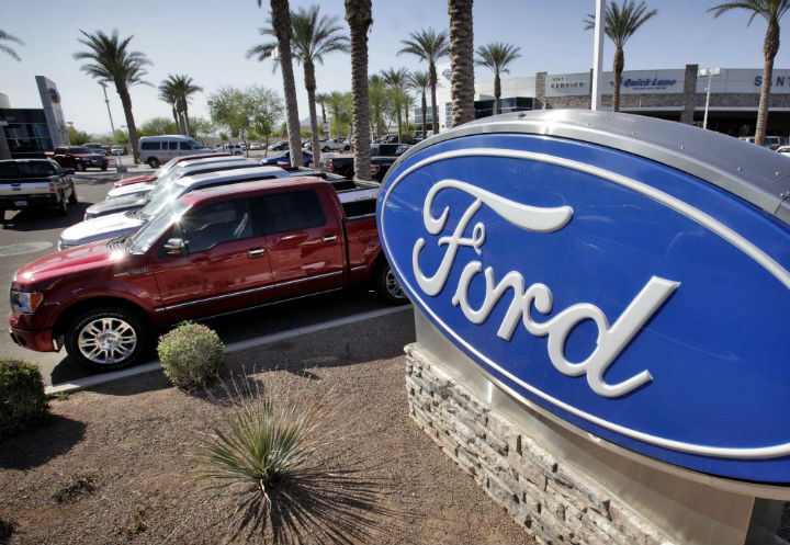 In this March 29, 2011 file photo, new 2011 Ford F-150 trucks are shown at a dealership in Glbert, Ariz.
