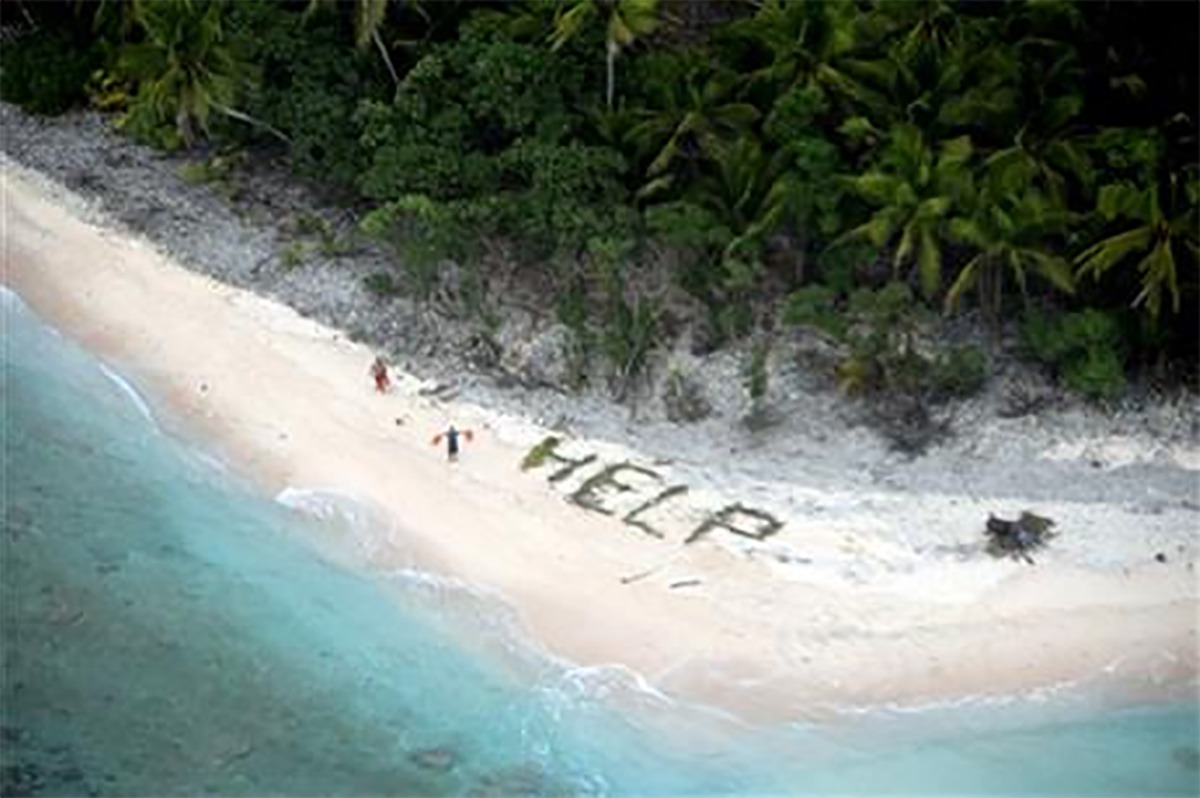 This photo provided by U.S. Navy released April 7, 2016 shows two men waving life jackets and look on as a U.S. Navy P-8A maritime surveillance aircraft discovers them on the uninhabited island of Fanadik. 