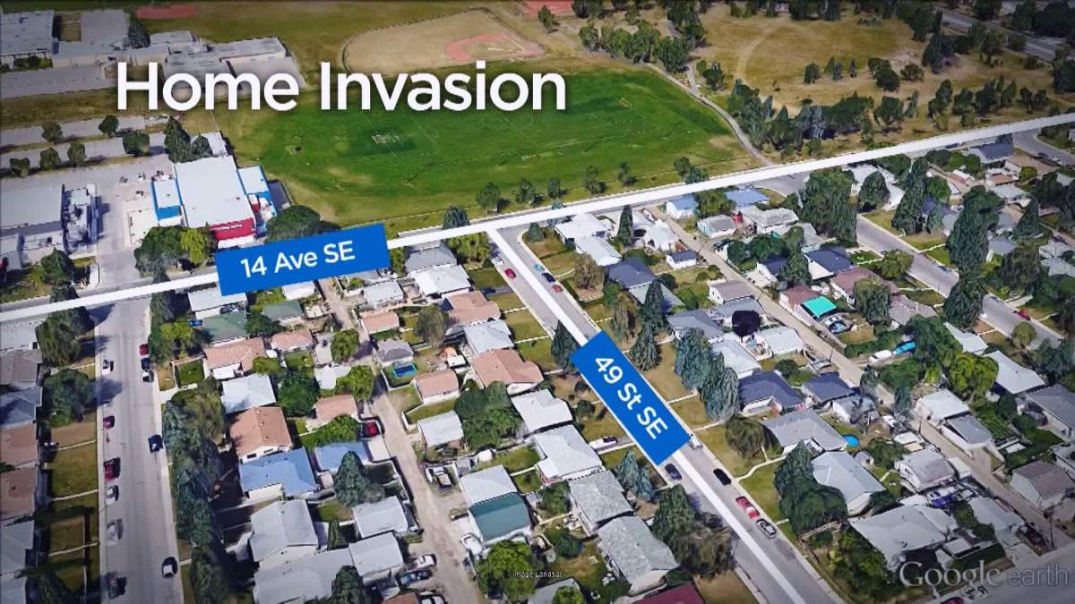 Calgary police investigate a home invasion in the 1500 block of 49 Street S.E. on Wednesday, April 13 2016.