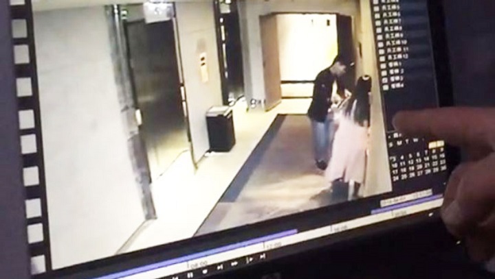 A still from a video showing an attack on a woman at a hotel in China.