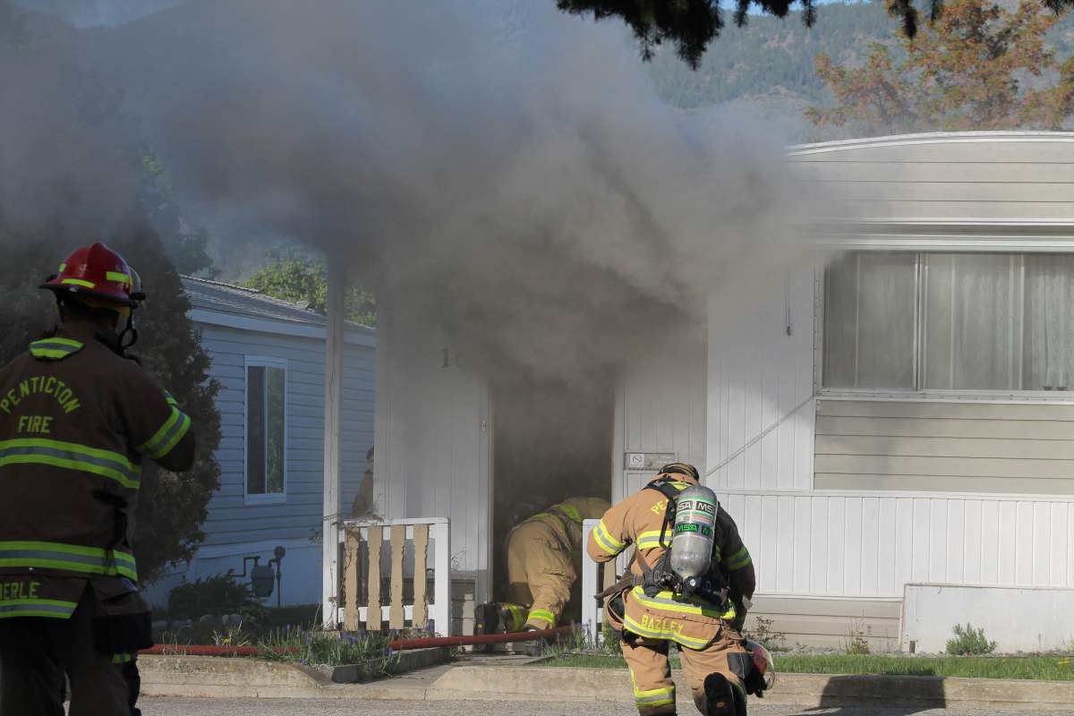 Owners flee fiery home in Penticton - image