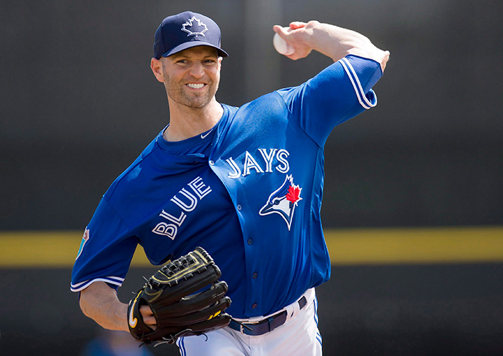 Toronto Blue Jays pitcher J.A. Happ throws during first inning action against the Baltimore Orioles at spring training in Dunedin, FLa., on Friday, March 4, 2016. 