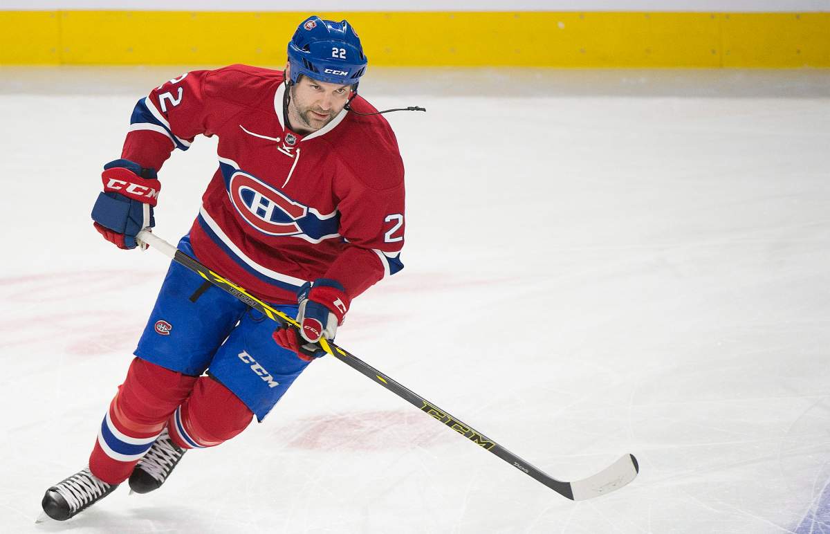 Montreal Canadiens' John Scott skates during the warm up prior to an NHL hockey game against the Florida Panthers in Montreal, Tuesday, April 5, 2016. It's Scott's first game with the NHL team after he was called up from their AHL affiliate in St. John's, Newfoundland and Labrador on Sunday.