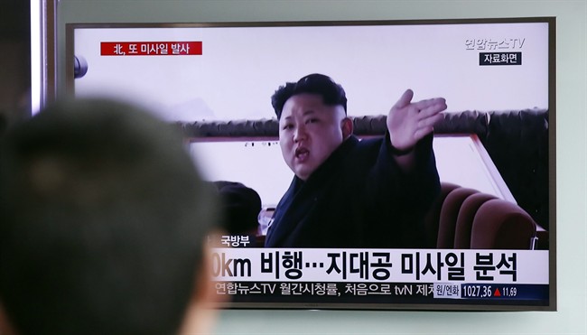 A man watches a TV news program showing file footage of North Korean leader Kim Jong Un at Seoul Railway Station in Seoul, South Korea, Friday, April 1, 2016. 