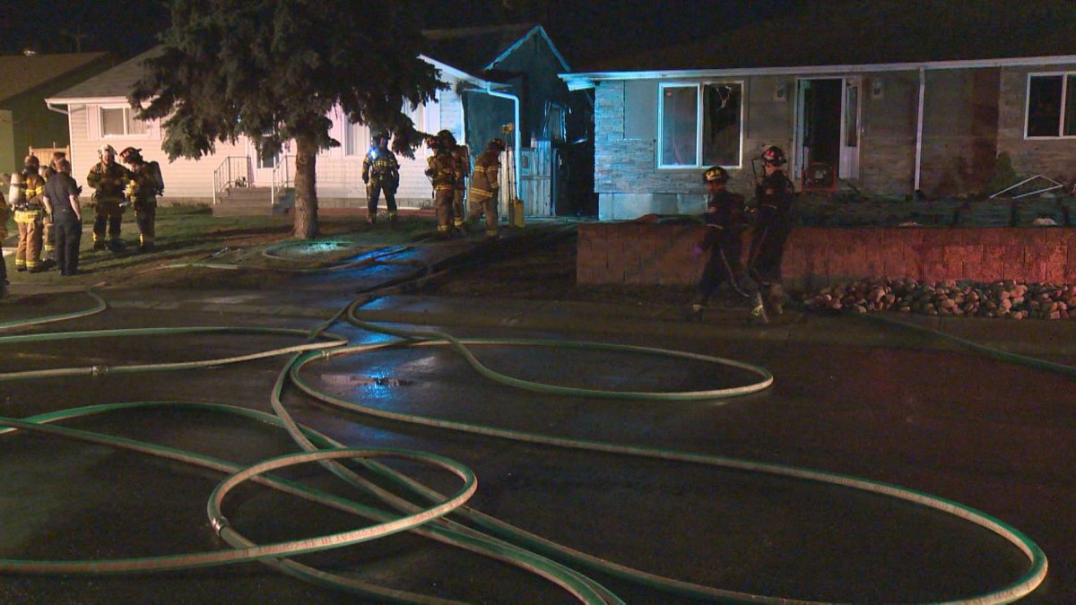 A home at 16113 110B Ave. in west Edmonton was heavily damaged in an overnight fire Tuesday. April 19, 2016.