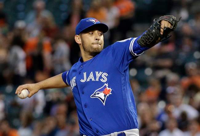 Toronto Blue Jays starting pitcher Marco Estrada throws to the Baltimore Orioles during the first inning of a baseball game in Baltimore, Thursday, April 21, 2016.