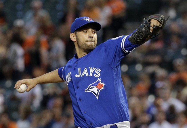 Toronto Blue Jays starting pitcher Marco Estrada throws to the Baltimore Orioles during the first inning of a baseball game in Baltimore, Thursday, April 21, 2016.