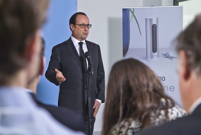 French President Franocis Hollande, delivers a speech as he visits a tech company in Boulogne-Billancourt, outside Paris, Monday, April 4, 2016. 