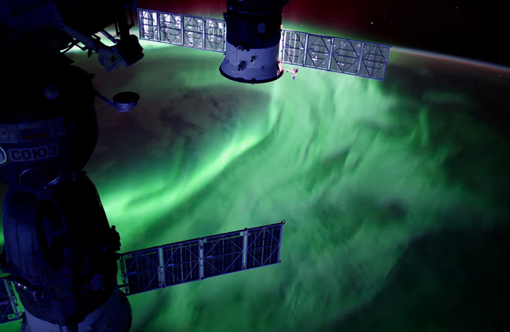 The northern lights dance across the sky, as seen from the International Space Station.
