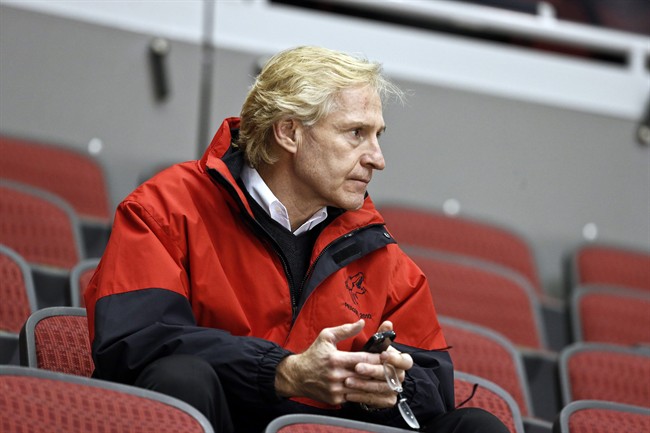 FILE:  In this Jan. 15, 2013 photo, then-Phoenix Coyotes general manager Don Maloney watches a Coyotes NHL hockey practice in Glendale, Ariz.