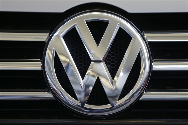 In this Feb. 14, 2013, file photo, the Volkswagen logo is seen on the grill of a Volkswagen on display in Pittsburgh. 