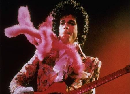 In this Jan. 11, 1985 file photo, Prince performs before a sold-out audience, in Houston.