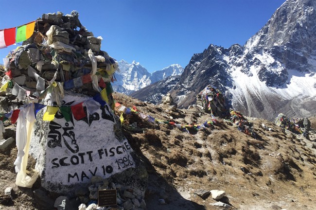 This April 9, 2016 photo shows a memorial stupa for U.S. mountain climber and guide Scott Fischer, on the outskirts of the village of Dughla, on the path to Everest Base Camp, Nepal. Fischer was among eight climbers who got killed during an Everest summit attempt when they were caught in a blizzard on May 10-11, 1996. A trek to Everest Base Camp along mountain paths that hug deep gorges offers renewal and a test of mental and physical limits. Along the way there are sore knees and altitude sickness, but the spectacular landscapes, friendly villagers and moments of tranquility make the journey an unforgettable experience. (AP Photo/Karin Laub).
