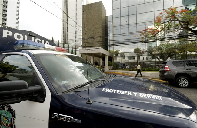 A police car stands outside the Mossack Fonseca law firm while Organized crime prosecutors raid the offices, in Panama City, Tuesday, April 12, 2016.