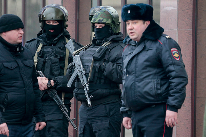 Police officers guard a court building in a town of Donetsk, Rostov-on-Don region, Russia, Tuesday, March 22, 2016. 