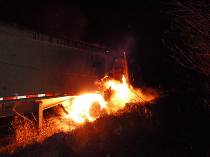 A semi tractor and a dump trailer were destroyed in a grass fire northwest of Saskatoon.