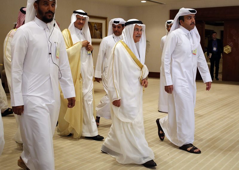 Saudi Oil Minister Ali al-Naimi, center right, arrives at an oil-producers' meeting in Doha, Qatar, on Sunday, April 17, 2016. Oil-producing countries are meeting in Qatar to discuss a possible freeze of production to counter low global prices, but Iran's last-minute decision to stay home could dilute the impact of any agreement. 