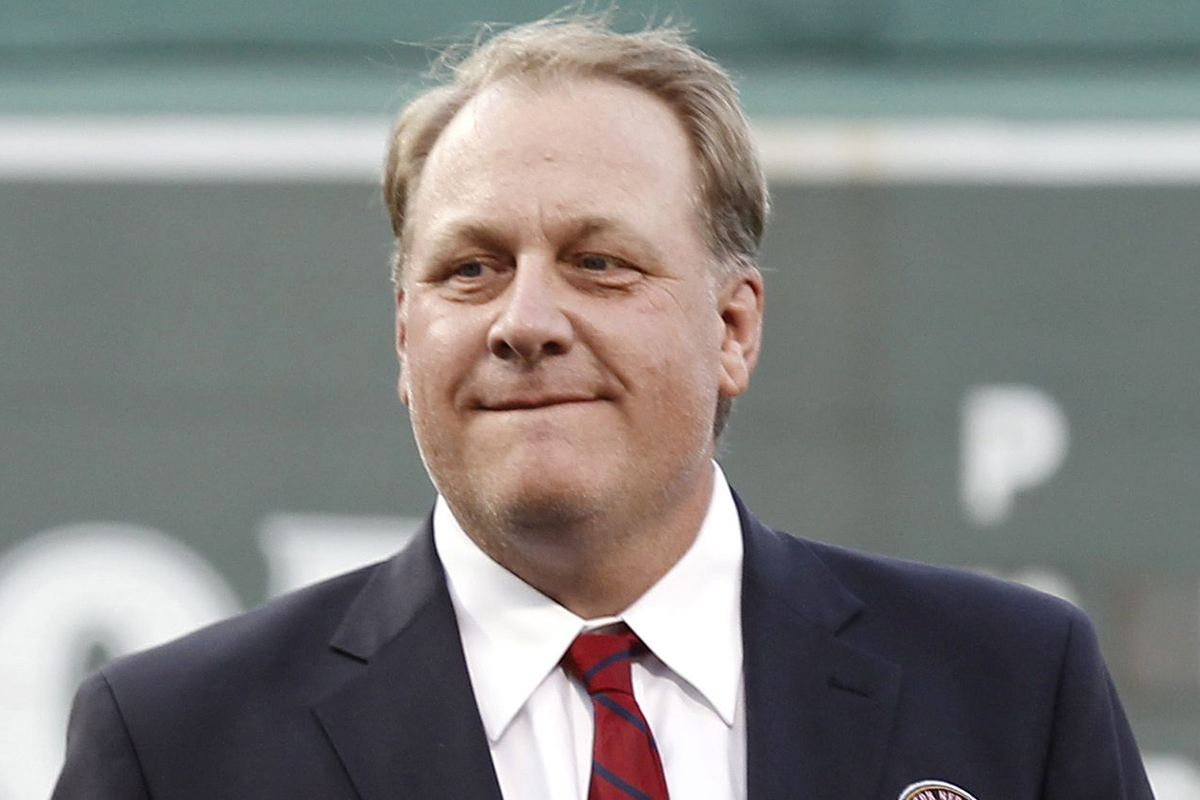  In this Aug. 3, 2012, file photo, former Boston Red Sox pitcher Curt Schilling looks on after being introduced as a new member of the Boston Red Sox Hall of Fame before a baseball game between the Red Sox and the Minnesota Twins at Fenway Park in Boston.