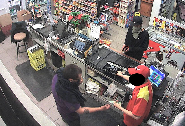Saskatoon police are asking for help in identifying two suspects responsible for an armed robbery at a gas station last week.