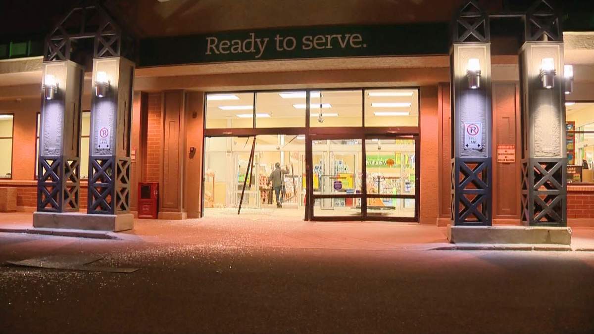 Police investigate an attempted smash and grab at a Sobeys in the 8000 block of 18 Street S.E. on Monday, April 4, 2016.
