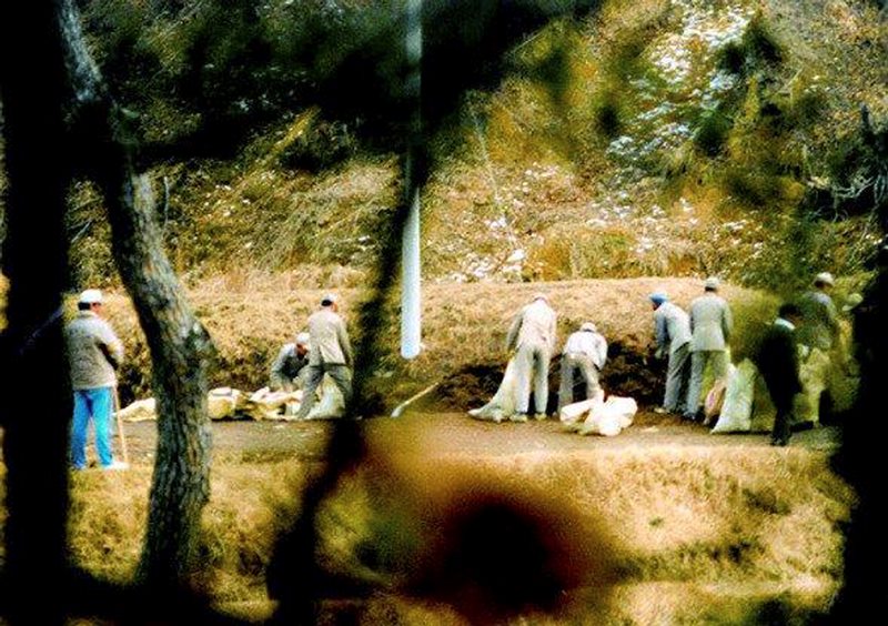 In this December 1986, photo provided by the Ulsan District Prosector’s Office, Brothers Home inmates work at a construction site in Ulsan, South Korea.