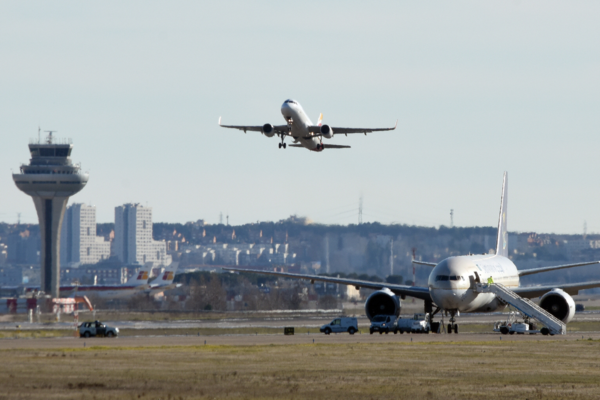 A plane takes off from Madrid airport.