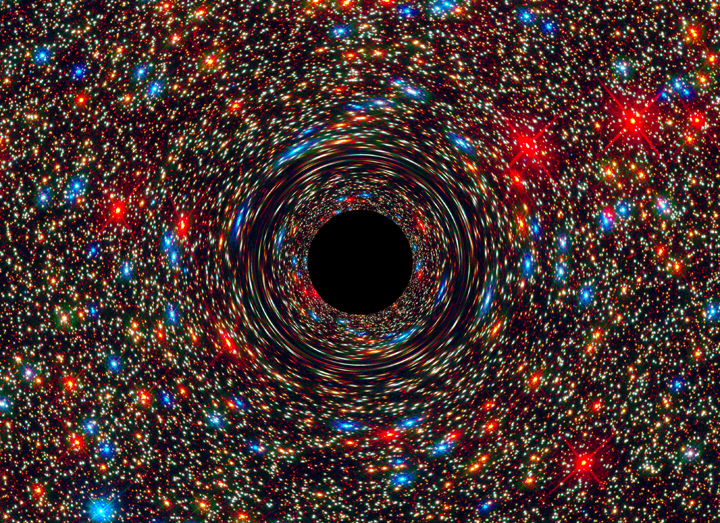 This computer-simulated image shows a supermassive black hole at the core of a galaxy. 