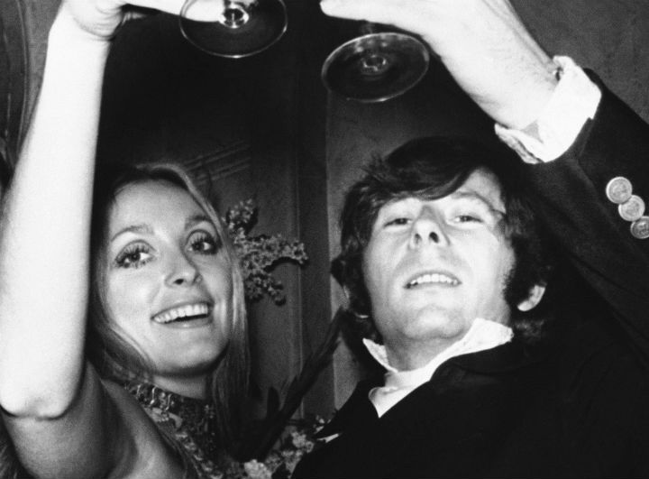 In this Feb. 18, 1969 file photo, Roman Polanski is shown with his wife, the actress Sharon Tate, toasting the opening of "Rosemary's Baby" in London.  (File photo)