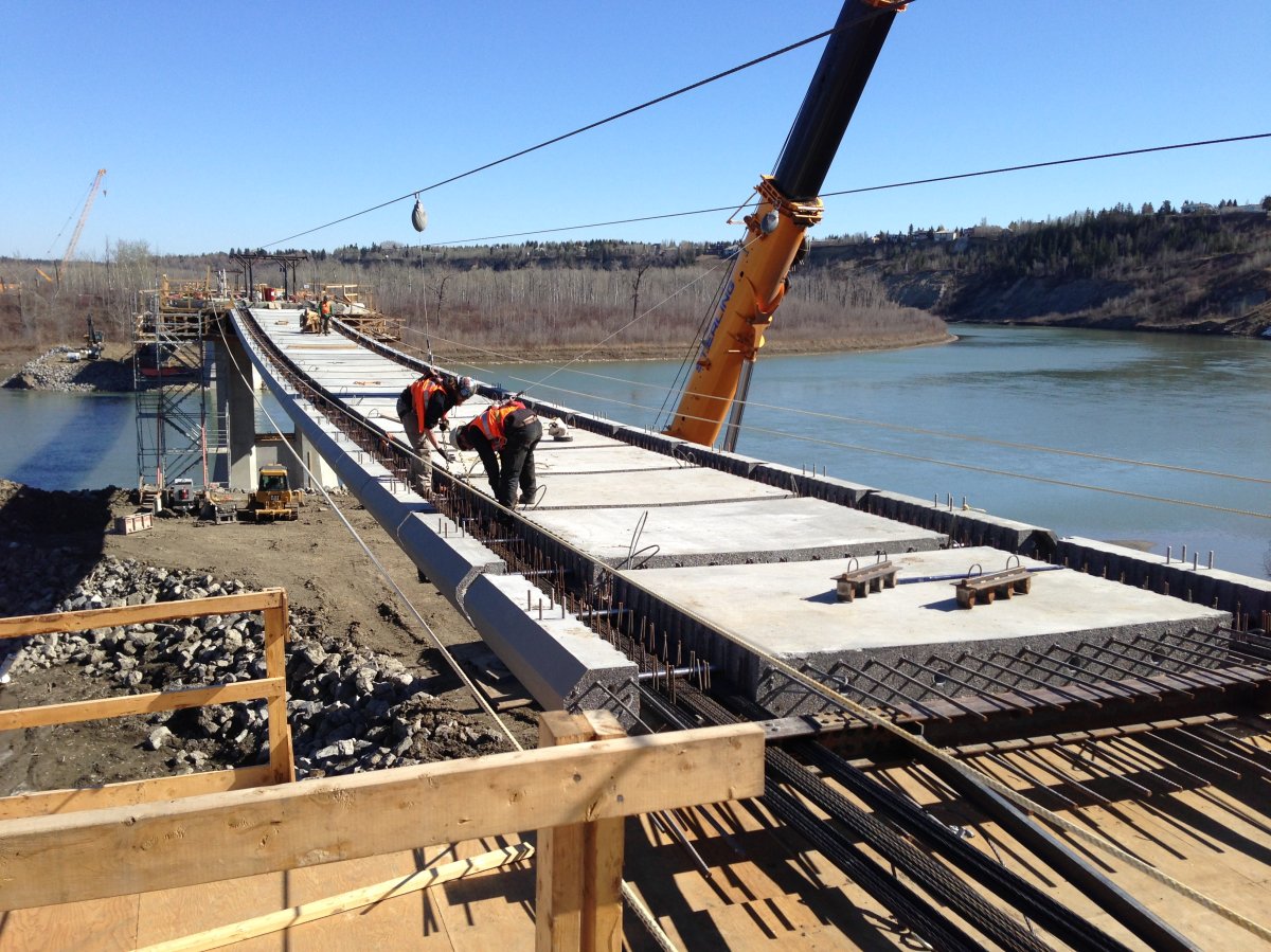 The City of Edmonton said it has begun installation of 86 stressed ribbon bridge deck panels, which will form the walking surface of the Terwillegar Park Footbridge. April 15, 2015.