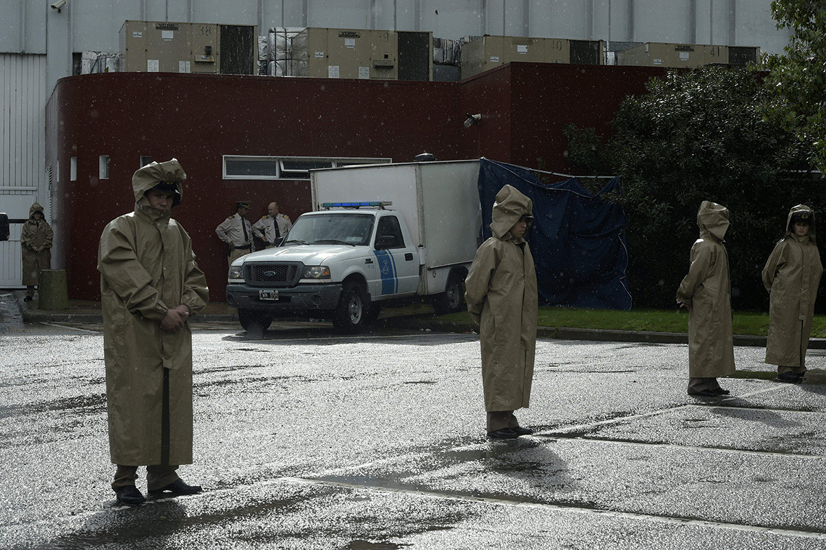 Maritime police with a vehicle that will carry bodies outside the Costa Salguero event venue in Buenos Aires, Argentina where five young people died of severe intoxication and others were hospitalized in critical condition during the Time Warp electronic music festival on April 16, 2016.