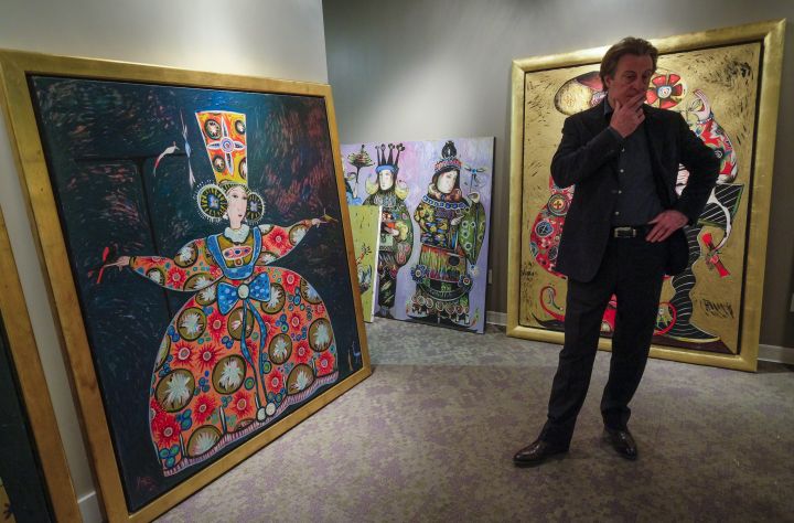 Christopher Talbot, president and CEO of Art Evolution, speaks about his friend and artist Toller Cranston at his gallery in Calgary, Alta., Thursday, April 7, 2016.