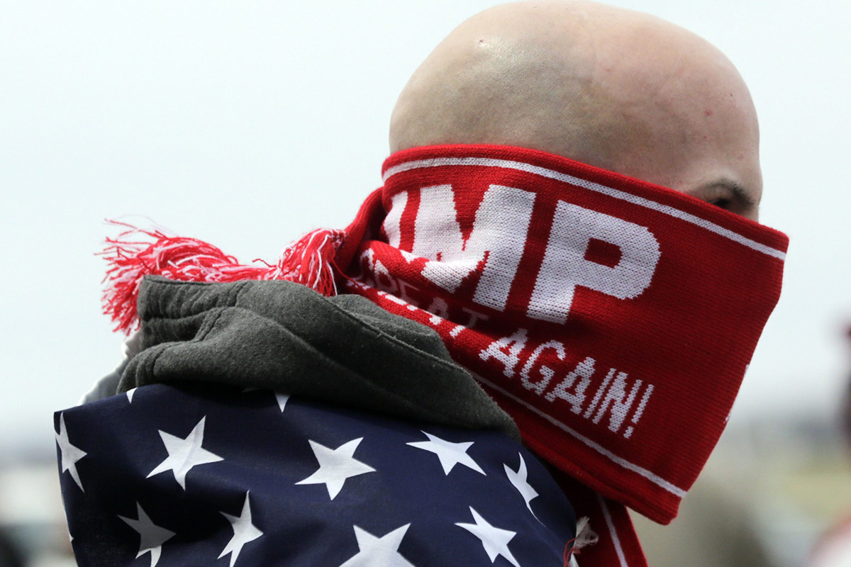 Anthony Gravitte of Geneva, N.Y., waits for a Donald Trump rally to begin on Sunday, April 10, 2016, in Rochester, N.Y. 