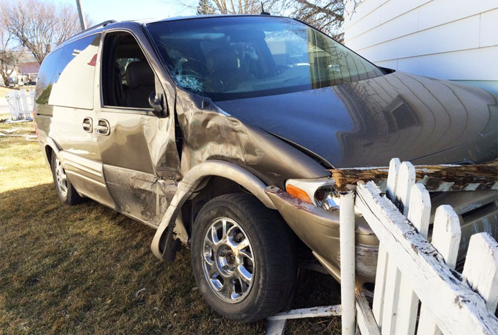 Saskatoon police are on the lookout for a third suspect who fled a stolen van that drove through a front yard on Saturday afternoon.