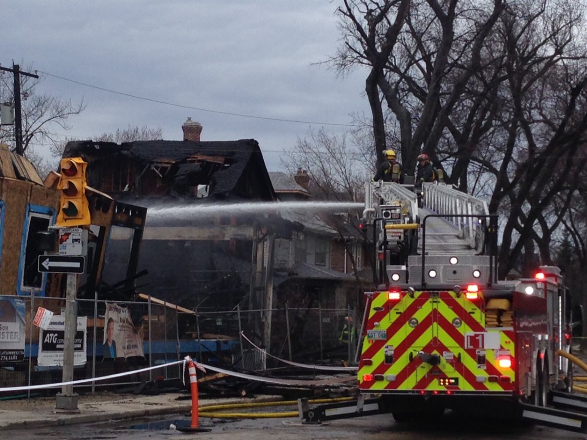 Firefighters worked on several buildings on Westminster Ave after Saturday's fire.