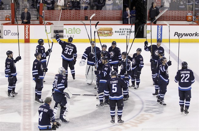 The Winnipeg Jets salute fans after their victory over the Minnesota Wild after their final home game of the season in Winnipeg in the 2015/2016 season. 