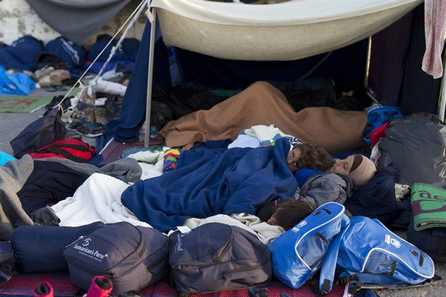 Migrants and refugees sleep at the port of the Greek island of Chios, Wednesday, April 6, 2016. On Monday, 202 migrants from 11 countries were sent back to Turkey from the Greek islands of Lesbos and Chios. 