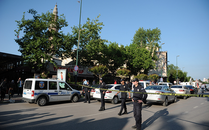 Police officers block the area near the site of a bombing, in Bursa, northwestern Turkey, on April 27, 2016. 