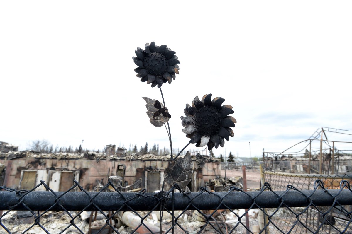 A burned out garden decoration is shown in the Abasands neighbourhood during a media tour of the fire-damaged city of Fort McMurray, Alta. on Monday, May 9, 2016. THE CANADIAN PRESS/Jonathan Hayward.