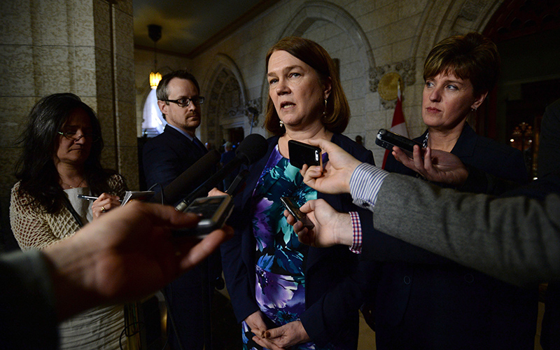 Minister of Health Jane Philpott and International Development Minister Marie-Claude Bibeau speak to reporters in the House of Commons foyer on Parliament Hill in Ottawa on Wednesday, May 11, 2016, regarding investments in the global fight against the Zika virus. 