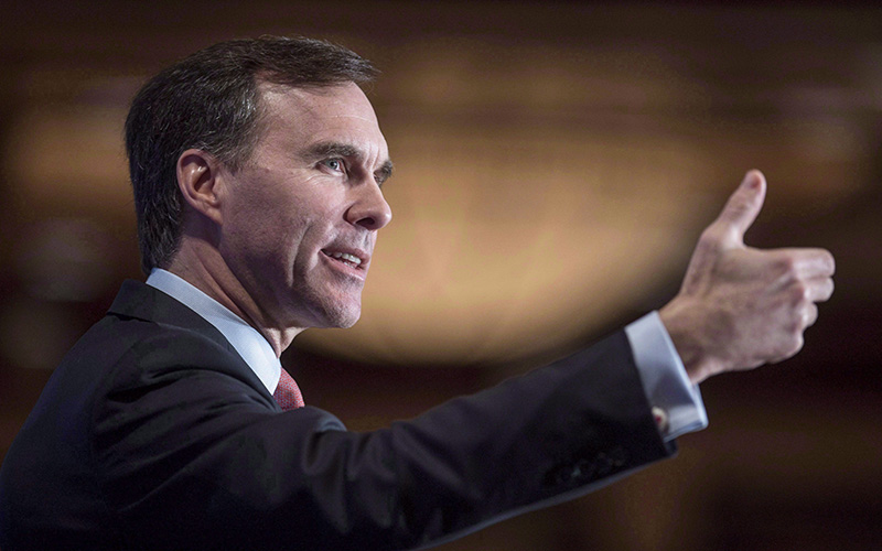 Finance Minister Bill Morneau delivers a speech in Montreal on January 12, 2016. 