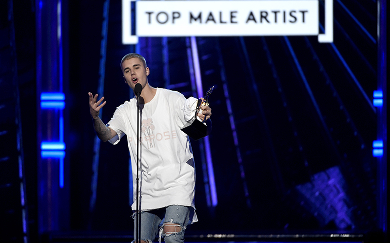 Justin Bieber accepts the award for top male artist at the Billboard Music Awards at the T-Mobile Arena on Sunday, May 22, 2016, in Las Vegas.