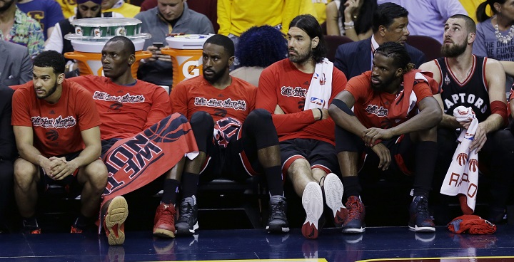 Toronto Raptors players sit on the bench during the second half of Game 5 of the NBA basketball Eastern Conference finals against the Cleveland Cavaliers on Wednesday, May 25, 2016, in Cleveland.